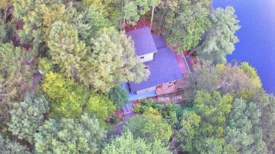 Privately set Lakefront Retreat with three levels of abundant on Lords Valley Country Club, Inc in Pennsylvania - for sale on GolfHomes.com, golf home, golf lot