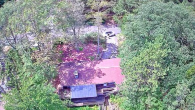 Privately set Lakefront Retreat with three levels of abundant on Lords Valley Country Club, Inc in Pennsylvania - for sale on GolfHomes.com, golf home, golf lot