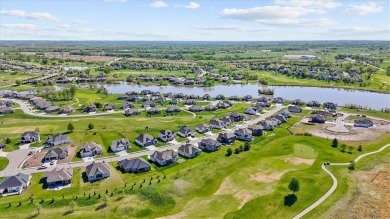 Lot 55 - The Hampton VI by New Mark Homes. Reverse 1.5 story on Falcon Lakes Golf Course in Kansas - for sale on GolfHomes.com, golf home, golf lot