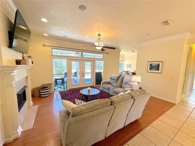 This beautiful Tommy Waters home is ideally located walking on Haile Plantation Golf and Country Club in Florida - for sale on GolfHomes.com, golf home, golf lot