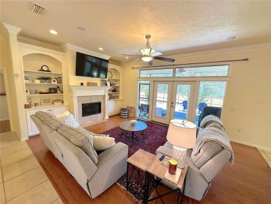 This beautiful Tommy Waters home is ideally located walking on Haile Plantation Golf and Country Club in Florida - for sale on GolfHomes.com, golf home, golf lot