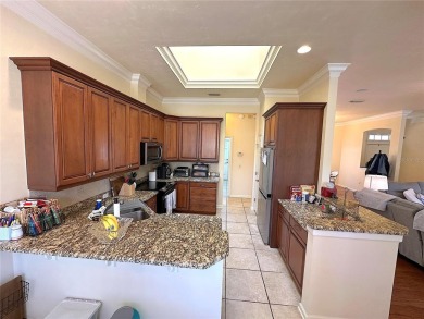 This beautiful Tommy Waters home is ideally located walking on Haile Plantation Golf and Country Club in Florida - for sale on GolfHomes.com, golf home, golf lot