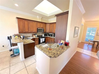 This beautiful Tommy Waters home is ideally located walking on Haile Plantation Golf and Country Club in Florida - for sale on GolfHomes.com, golf home, golf lot