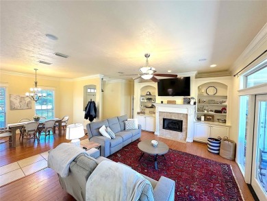 This beautiful Tommy Waters home is ideally located walking on Haile Plantation Golf and Country Club in Florida - for sale on GolfHomes.com, golf home, golf lot