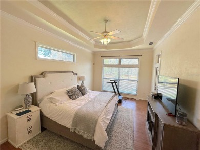 This beautiful Tommy Waters home is ideally located walking on Haile Plantation Golf and Country Club in Florida - for sale on GolfHomes.com, golf home, golf lot