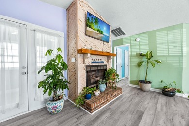 This inviting single-level three-bedroom, two-bath beach home is on Whispering Pines in South Carolina - for sale on GolfHomes.com, golf home, golf lot