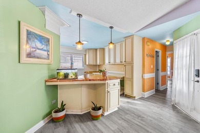 This inviting single-level three-bedroom, two-bath beach home is on Whispering Pines in South Carolina - for sale on GolfHomes.com, golf home, golf lot