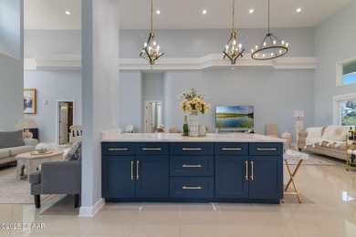 Stunning 3-Bedroom, 3-Bath Luxury Home in the Prestigious on Plantation Bay Golf and Country Club in Florida - for sale on GolfHomes.com, golf home, golf lot