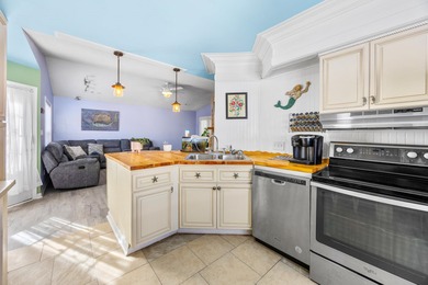 This inviting single-level three-bedroom, two-bath beach home is on Whispering Pines in South Carolina - for sale on GolfHomes.com, golf home, golf lot