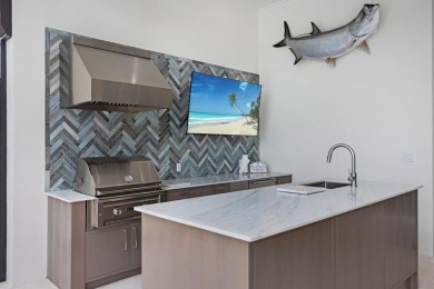 Discover unparalleled luxury in this custom built 4 bedroom 5 on Ocean Reef Club in Florida - for sale on GolfHomes.com, golf home, golf lot
