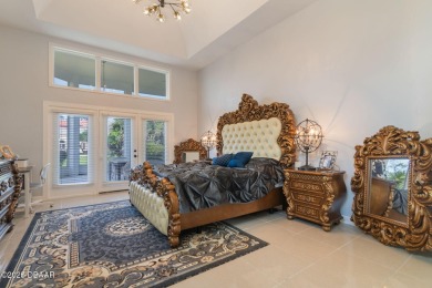 Stunning 3-Bedroom, 3-Bath Luxury Home in the Prestigious on Plantation Bay Golf and Country Club in Florida - for sale on GolfHomes.com, golf home, golf lot
