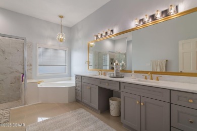 Stunning 3-Bedroom, 3-Bath Luxury Home in the Prestigious on Plantation Bay Golf and Country Club in Florida - for sale on GolfHomes.com, golf home, golf lot