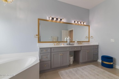 Stunning 3-Bedroom, 3-Bath Luxury Home in the Prestigious on Plantation Bay Golf and Country Club in Florida - for sale on GolfHomes.com, golf home, golf lot