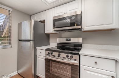 Light, bright, and beautiful end-unit condo with gorgeous golf on Cross Creek Country Club in Florida - for sale on GolfHomes.com, golf home, golf lot