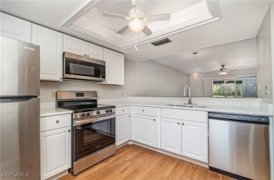 Light, bright, and beautiful end-unit condo with gorgeous golf on Cross Creek Country Club in Florida - for sale on GolfHomes.com, golf home, golf lot