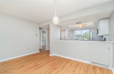 Light, bright, and beautiful end-unit condo with gorgeous golf on Cross Creek Country Club in Florida - for sale on GolfHomes.com, golf home, golf lot
