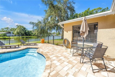 Where golf community living meets lakeside retreat... all just a on Seminole Lake Country Club in Florida - for sale on GolfHomes.com, golf home, golf lot