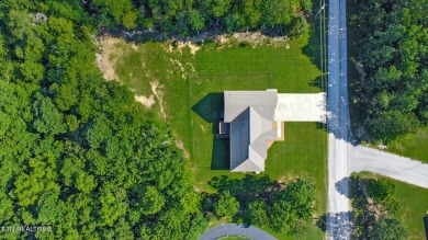 Don't miss the opportunity to own one of the finest homes in the on Mountain Ridge Golf Club in Tennessee - for sale on GolfHomes.com, golf home, golf lot