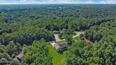 Don't miss the opportunity to own one of the finest homes in the on Mountain Ridge Golf Club in Tennessee - for sale on GolfHomes.com, golf home, golf lot