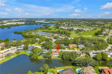 Where golf community living meets lakeside retreat... all just a on Seminole Lake Country Club in Florida - for sale on GolfHomes.com, golf home, golf lot