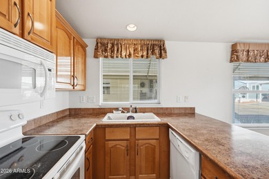 Welcome to this charming single-story manufactured home offering on Viewpoint Golf Resort in Arizona - for sale on GolfHomes.com, golf home, golf lot