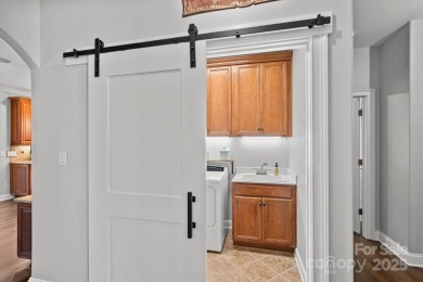Welcome to 7809 Oak Haven Lane, a beautifully appointed home in on Cowans Ford Country Club in North Carolina - for sale on GolfHomes.com, golf home, golf lot