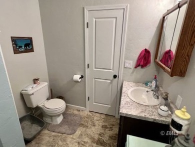This fully remodeled two-unit condo comes with all the bells and on Miles City Town and Country Club in Montana - for sale on GolfHomes.com, golf home, golf lot