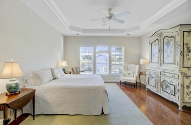 Pond living in this spacious, turn-key home in Del Webb Cane Bay on Cypress Point Par 3 in South Carolina - for sale on GolfHomes.com, golf home, golf lot