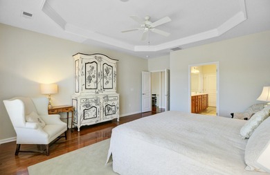 Pond living in this spacious, turn-key home in Del Webb Cane Bay on Cypress Point Par 3 in South Carolina - for sale on GolfHomes.com, golf home, golf lot