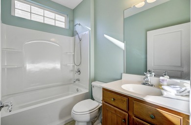 Pond living in this spacious, turn-key home in Del Webb Cane Bay on Cypress Point Par 3 in South Carolina - for sale on GolfHomes.com, golf home, golf lot