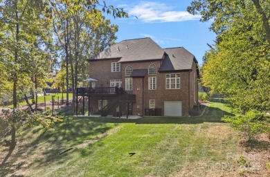 Welcome to 7809 Oak Haven Lane, a beautifully appointed home in on Cowans Ford Country Club in North Carolina - for sale on GolfHomes.com, golf home, golf lot