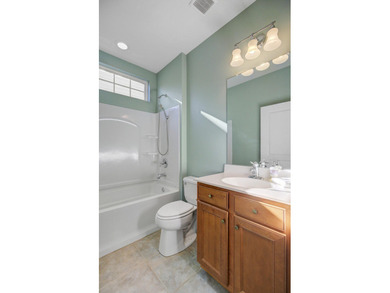 Pond living in this spacious, turn-key home in Del Webb Cane Bay on Cypress Point Par 3 in South Carolina - for sale on GolfHomes.com, golf home, golf lot