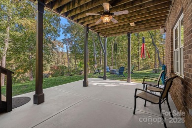 Welcome to 7809 Oak Haven Lane, a beautifully appointed home in on Cowans Ford Country Club in North Carolina - for sale on GolfHomes.com, golf home, golf lot