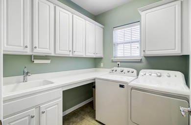 Pond living in this spacious, turn-key home in Del Webb Cane Bay on Cypress Point Par 3 in South Carolina - for sale on GolfHomes.com, golf home, golf lot