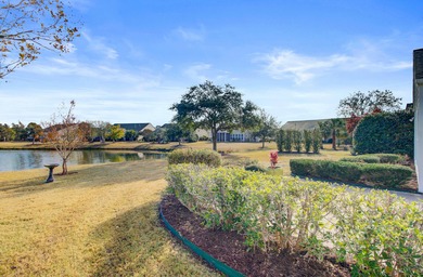 Pond living in this spacious, turn-key home in Del Webb Cane Bay on Cypress Point Par 3 in South Carolina - for sale on GolfHomes.com, golf home, golf lot