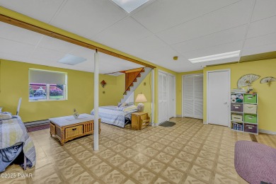 Chalet-Style Retreat in The Hideout This 4-Bedroom, 3-Bath on The Hideout Golf in Pennsylvania - for sale on GolfHomes.com, golf home, golf lot
