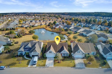 Pond living in this spacious, turn-key home in Del Webb Cane Bay on Cypress Point Par 3 in South Carolina - for sale on GolfHomes.com, golf home, golf lot