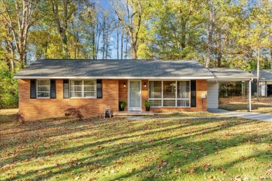 This BEAUTIFUL 3-bedroom BRICK home is located a short walk away on Dalton Golf and Country Club in Georgia - for sale on GolfHomes.com, golf home, golf lot