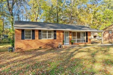 This BEAUTIFUL 3-bedroom BRICK home is located a short walk away on Dalton Golf and Country Club in Georgia - for sale on GolfHomes.com, golf home, golf lot