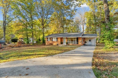 This BEAUTIFUL 3-bedroom BRICK home is located a short walk away on Dalton Golf and Country Club in Georgia - for sale on GolfHomes.com, golf home, golf lot