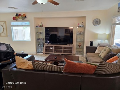 Discover this stunning two-story home nestled in the prestigious on Rhodes Ranch Golf Club in Nevada - for sale on GolfHomes.com, golf home, golf lot