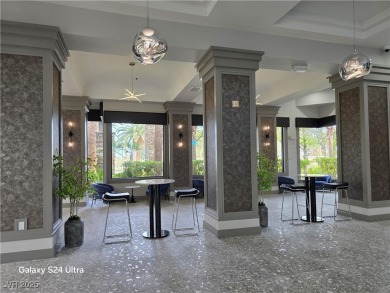 Discover this stunning two-story home nestled in the prestigious on Rhodes Ranch Golf Club in Nevada - for sale on GolfHomes.com, golf home, golf lot
