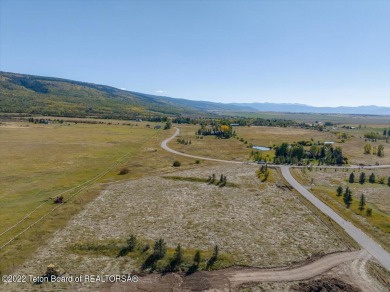 Coveted Alta, WY building site with expansive views of Grand on Targhee Village Golf Course in Wyoming - for sale on GolfHomes.com, golf home, golf lot
