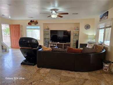 Discover this stunning two-story home nestled in the prestigious on Rhodes Ranch Golf Club in Nevada - for sale on GolfHomes.com, golf home, golf lot