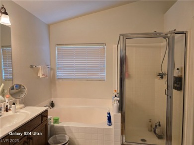Discover this stunning two-story home nestled in the prestigious on Rhodes Ranch Golf Club in Nevada - for sale on GolfHomes.com, golf home, golf lot