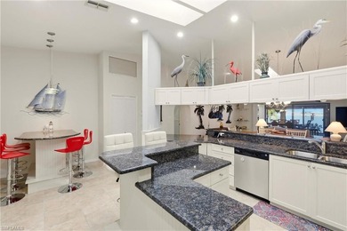 Wake up each day to million-dollar waterfront views overlooking on Saint Andrews South Golf Club in Florida - for sale on GolfHomes.com, golf home, golf lot