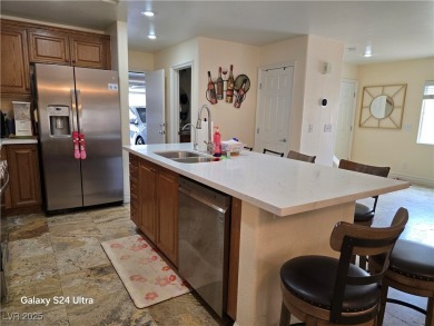 Discover this stunning two-story home nestled in the prestigious on Rhodes Ranch Golf Club in Nevada - for sale on GolfHomes.com, golf home, golf lot
