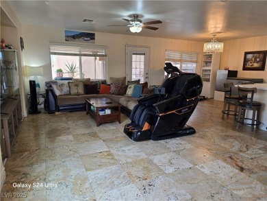 Discover this stunning two-story home nestled in the prestigious on Rhodes Ranch Golf Club in Nevada - for sale on GolfHomes.com, golf home, golf lot