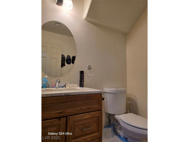 Discover this stunning two-story home nestled in the prestigious on Rhodes Ranch Golf Club in Nevada - for sale on GolfHomes.com, golf home, golf lot