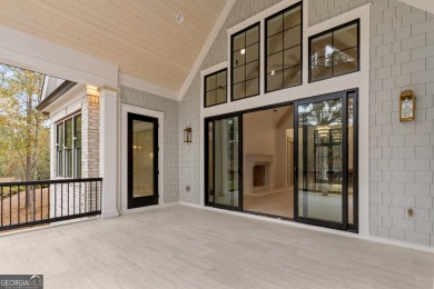 This meticulous custom golf residence is impeccably built with on Reynolds Lake Oconee - The Oconee in Georgia - for sale on GolfHomes.com, golf home, golf lot